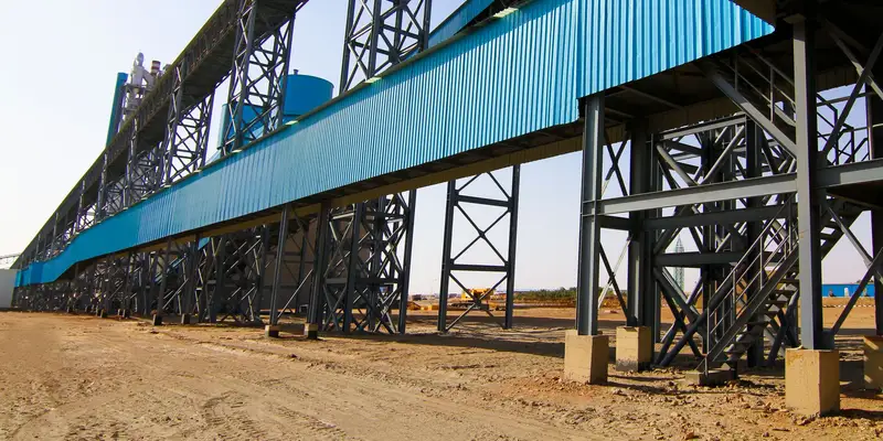 Newly constructed elevated conveyor gallery at a processing plant